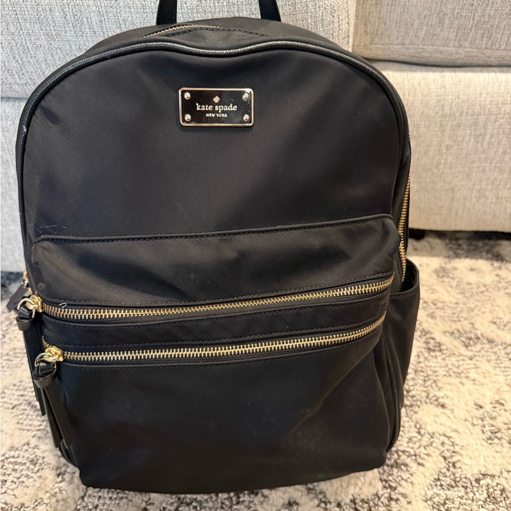 kate spade black nylon backpack with gold hardware and dual front zippers